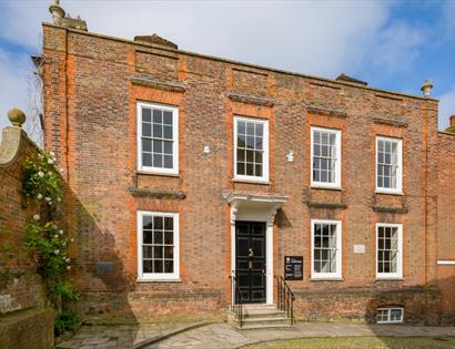 Exterior of Lamb House in Rye, a Georgian brick building with sash windows and a black front door