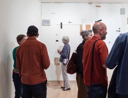 group looking at artworks at Hastings Contemporary.