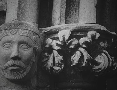 relief of face in stone architecture