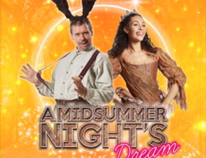 poster for midsummer nights dream with orange sparkly background and two characters inc man with donkey ears