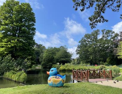giant blue painted rubber duck by pond at alexandra park hastings