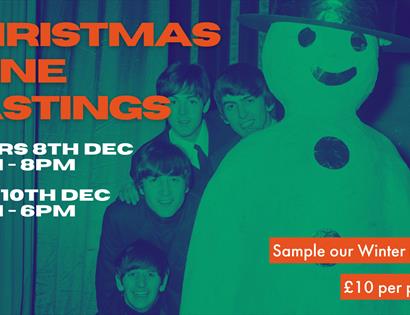 Poster for Christmas wine tasting event. Background shows large white snowman with The Beatles behind.