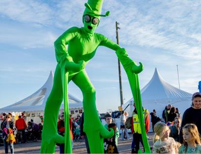 Man on stilts