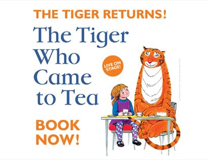 Poster for “The Tiger Who Came to Tea” live show, with illustration of a child and tiger sitting at a table.
