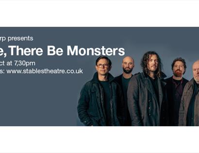 Poster for Here, There Be Monsters, featuring a five-piece band and Stables Theatre performance details.