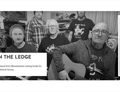 Black-and-white promotional image of folk band Meet on the Ledge performing together at White Rock Hastings