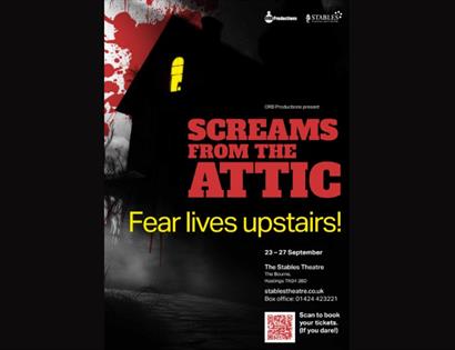 Poster for Screams from the Attic at The Stables Theatre, featuring a dark haunted house and glowing window.