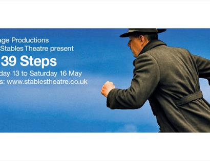Poster for “The 39 Steps,” showing a figure in a coat running against a blue sky, with performance dates and booking details.