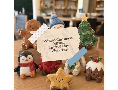 Winter and Christmas clay workshop featuring handmade festive characters inspired by Jellycat-style designs.