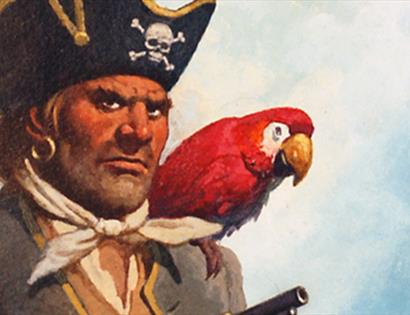 Promotional image for Quantum Theatre’s Treasure Island at Bodiam Castle, featuring a pirate with a parrot on his shoulder.