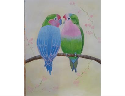 Painting of two brightly coloured lovebirds perched on a branch with soft pink blossoms.
