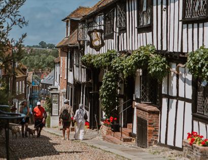 Historic Mermaid Inn on cobbled Mermaid Street in Rye, with timber-framed façade and ivy-covered walls.
