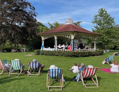Alexander park with people in sun chairs