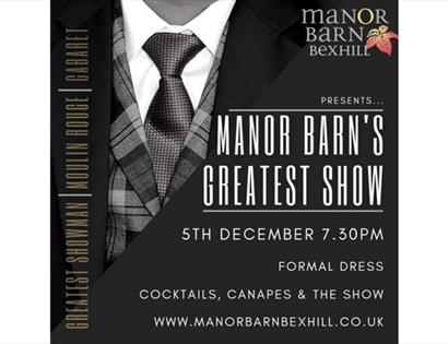 a poster showing a black suit jacket and title. Text reads Manor Barn's Greatest Show.