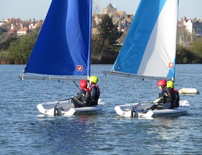 two windsails on the water.