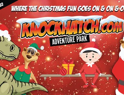 red poster for Knockhatch with cartoon of an elf on a shelf, dinosaur and two meerkats.