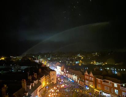 a photograph of battle high street at night, taken from a high rooftop angle.