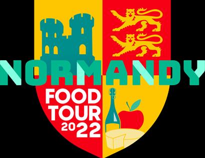 Poster wtih four medieval shield and 'Normandy' written on top in green letters.