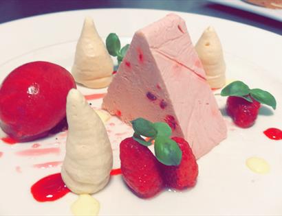 Gourmet food arranged on a plate.