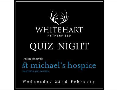white hart inn poster, black background whit white text saying 'White Hart Quiz Night'.