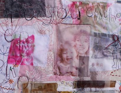 textile collage piece with embroidery, photographs and ink