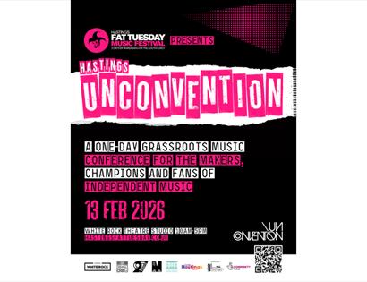 A bold and vibrant event poster for the Hastings Fat Tuesday Music Festival. The background is black with bright pink and white text elements. At the