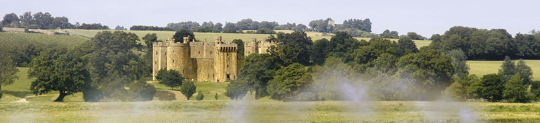 Bodiam Castle with steam train in foreground