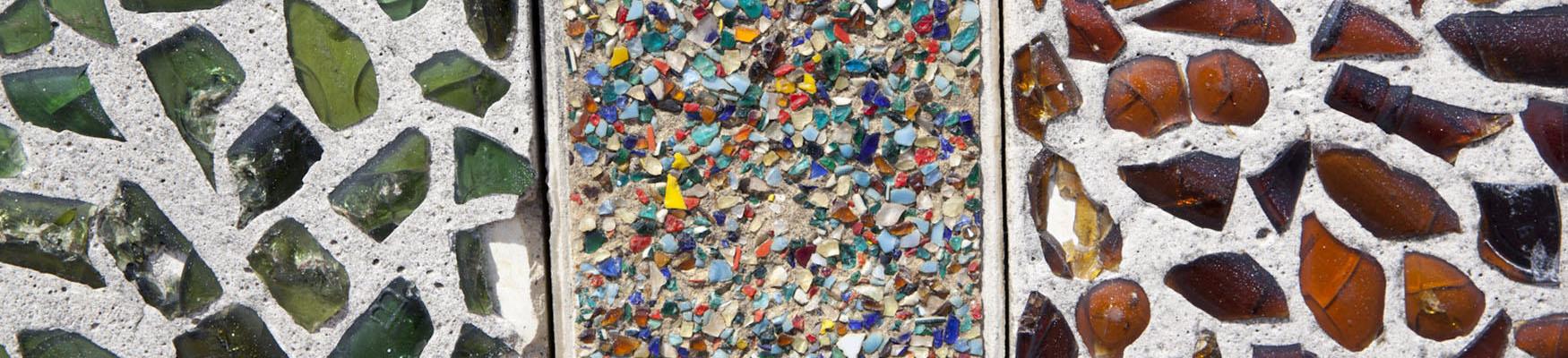 Coloured glass and pebble walls in bottle alley