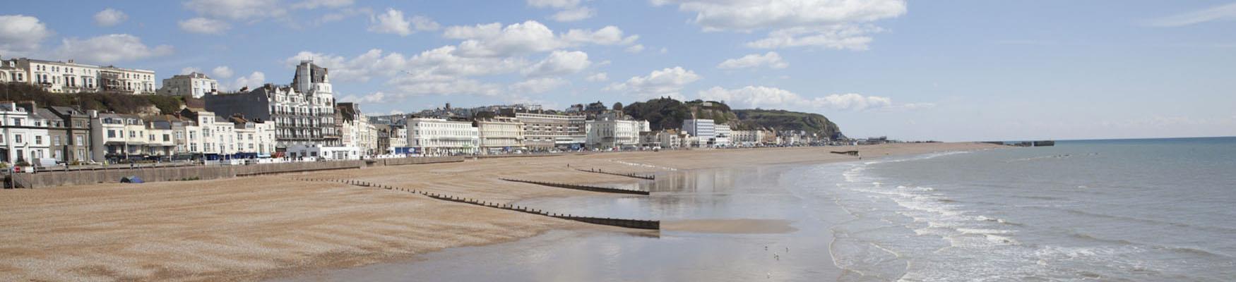 View of Hastings seafront and east hill from pier