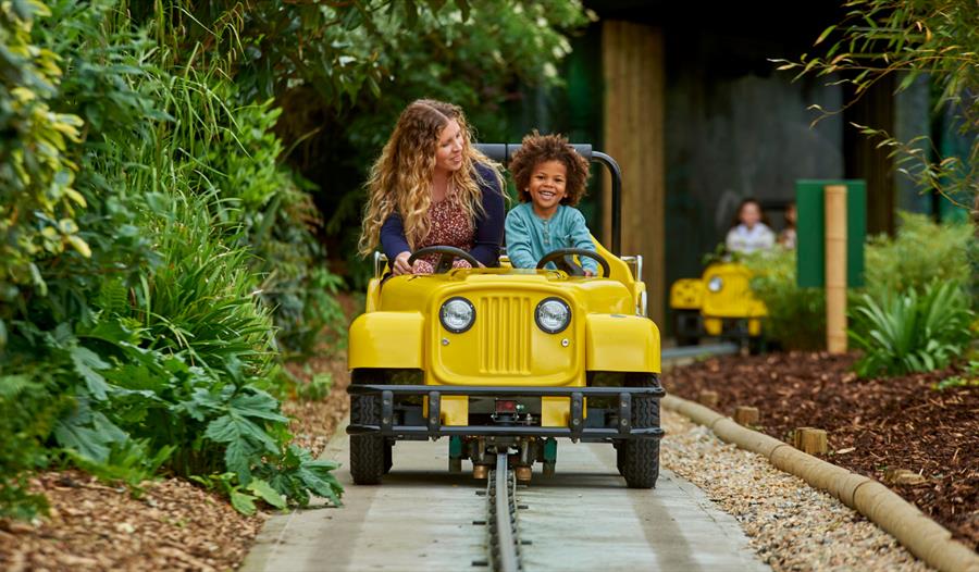 woman and child at drusillas on safari ride experience.