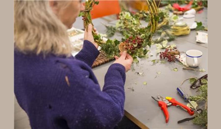 Lady making a wreath