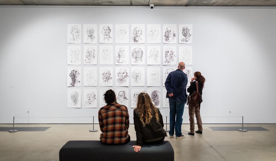 Hastings Contemporary exhibition interior with Quentin Blake sketches on a white wall