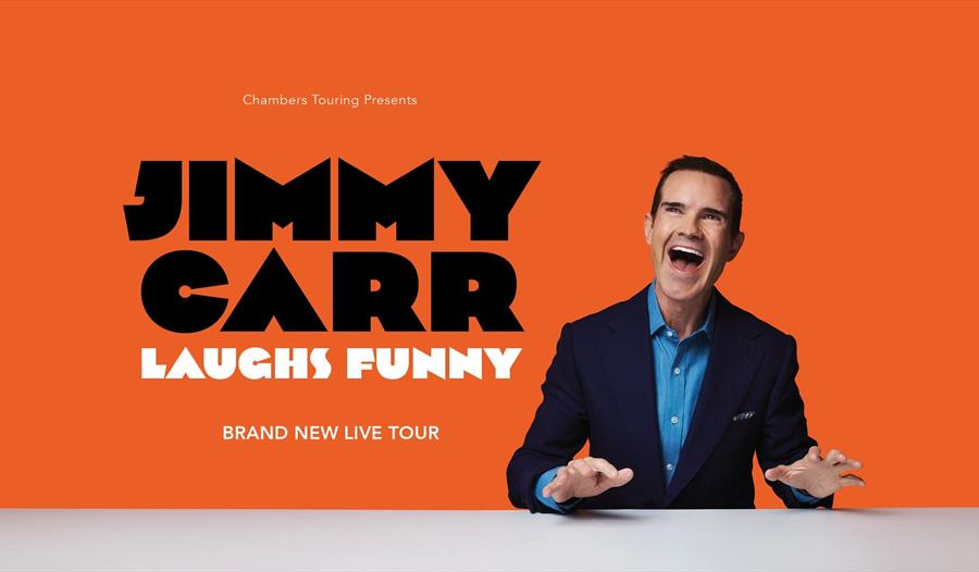 Jimmy Carr on an orange background