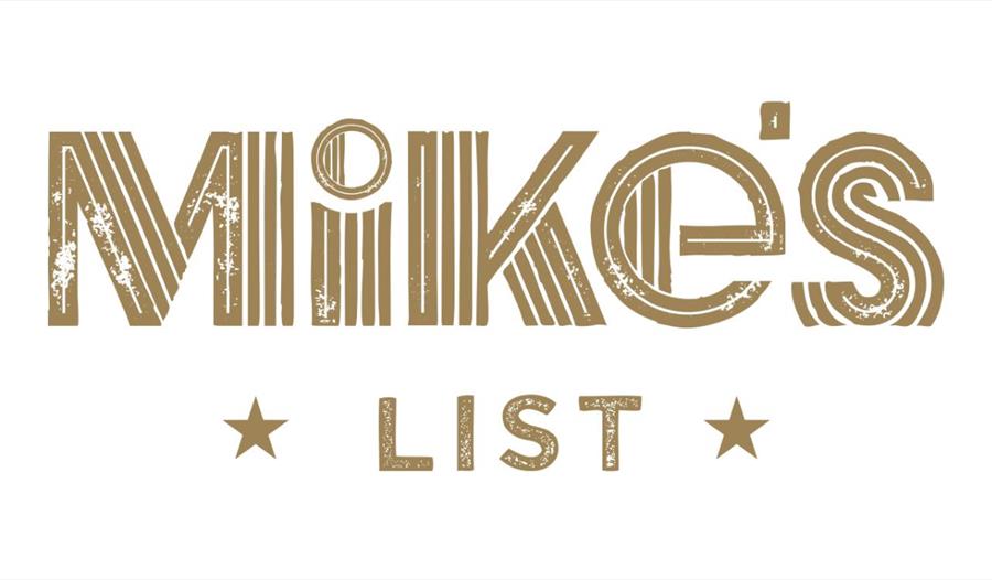 Logo with distressed gold text reading 'Mike's List' and two stars on either side of the word 'LIST'.