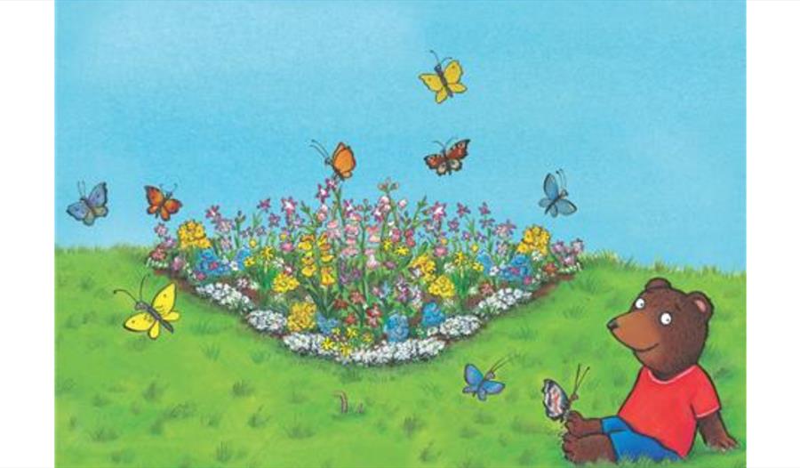 Ben plants a butterfly garden trail