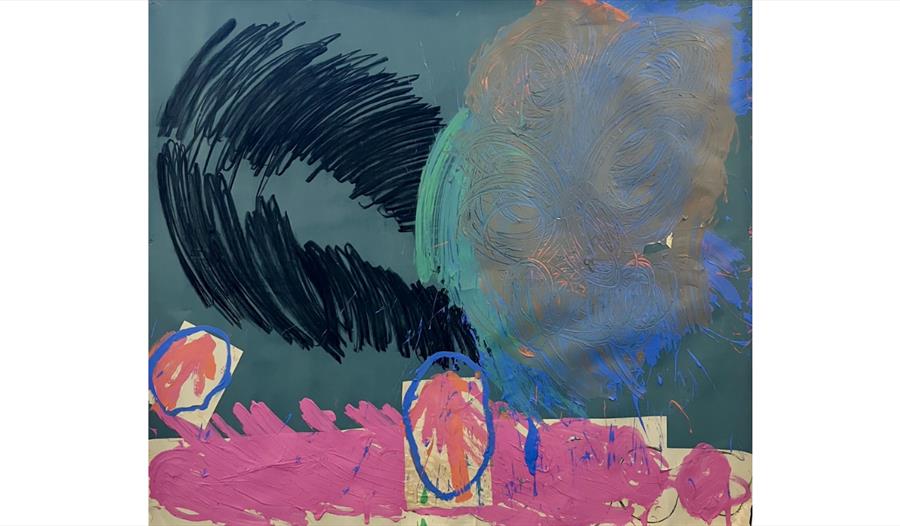 Abstract studio installation with sweeping black brushstrokes, layered blue-grey swirls and bold pink painted forms.