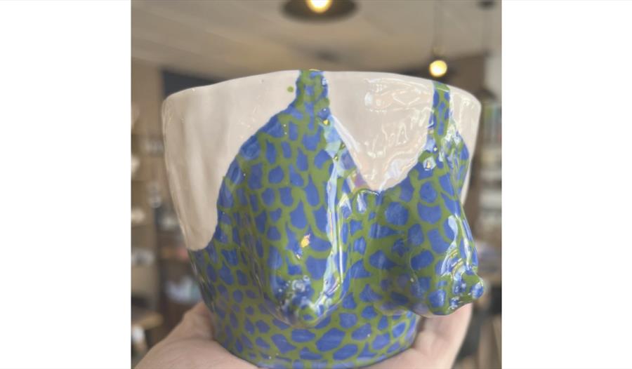 Handmade ceramic torso vase with colourful pattern, created during an adults-only clay making workshop.
