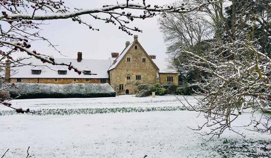 Photo of Michleham Priory in the snow.