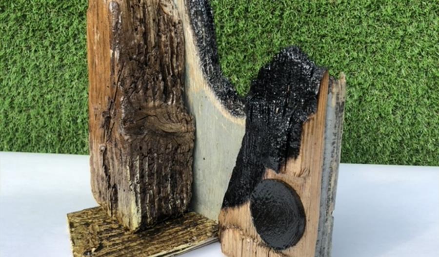 artwork sculpture made of reclaimed wood.