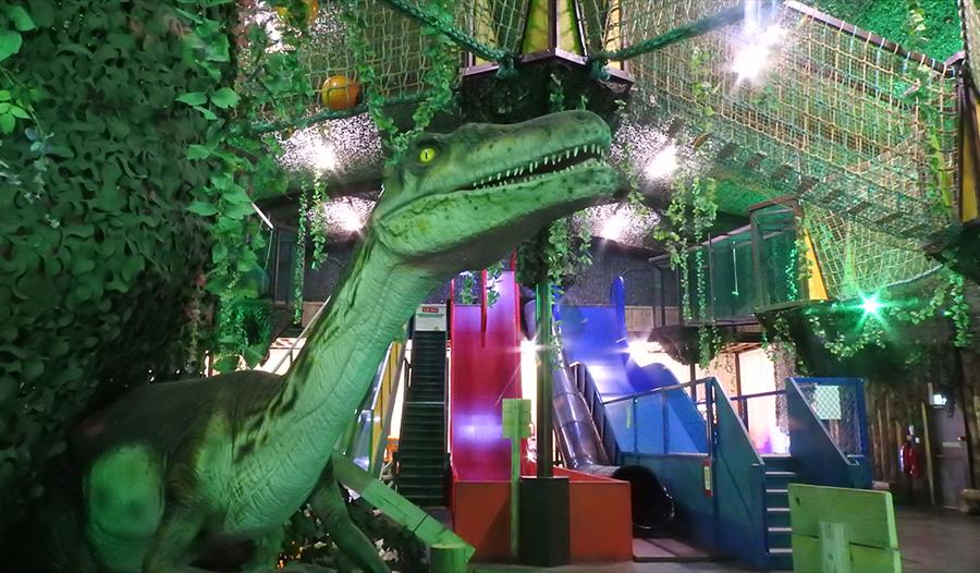 dinosaur in soft play barn at Knockhatch