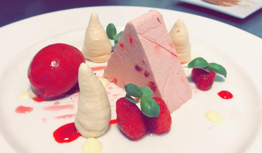 Gourmet food arranged on a plate.
