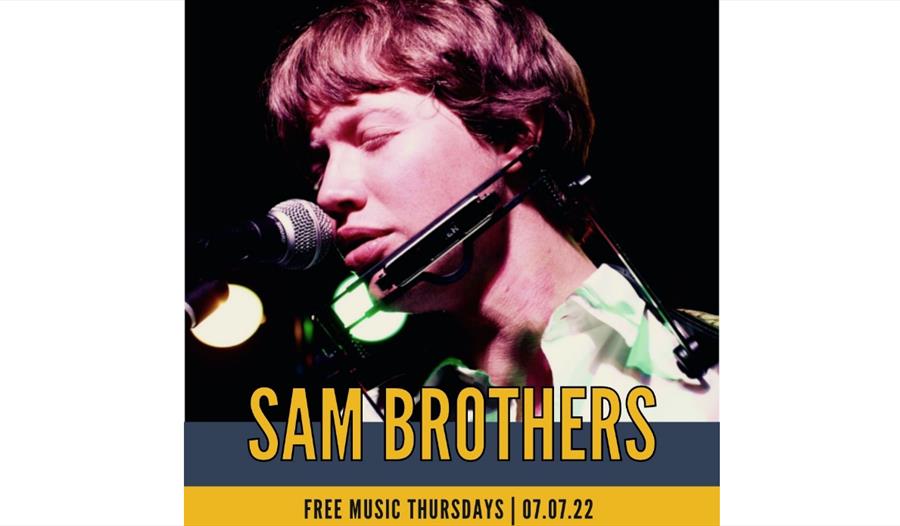 poster for sam brothers gig shows man singing into microphone