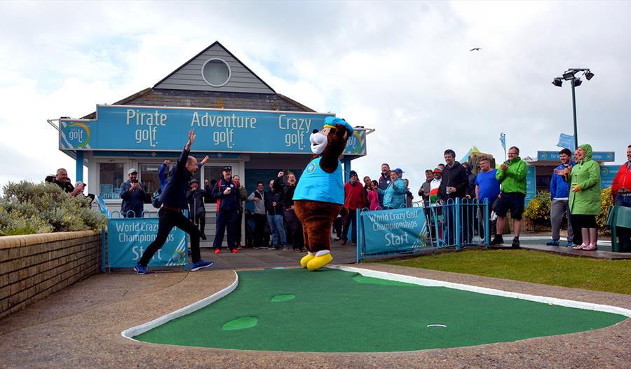 bear mascot leaping at hastings adventure golf