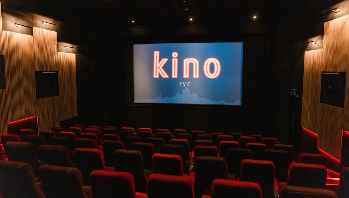 Interior of Kino Rye cinema with plush seating and large screen in a modern auditorium.