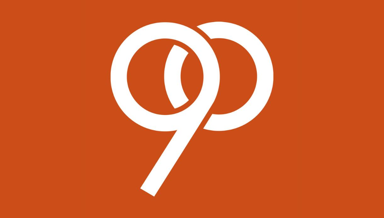 90th anniversary mark for the De La Warr Pavilion designed by Tom Geismar on an orange background.
