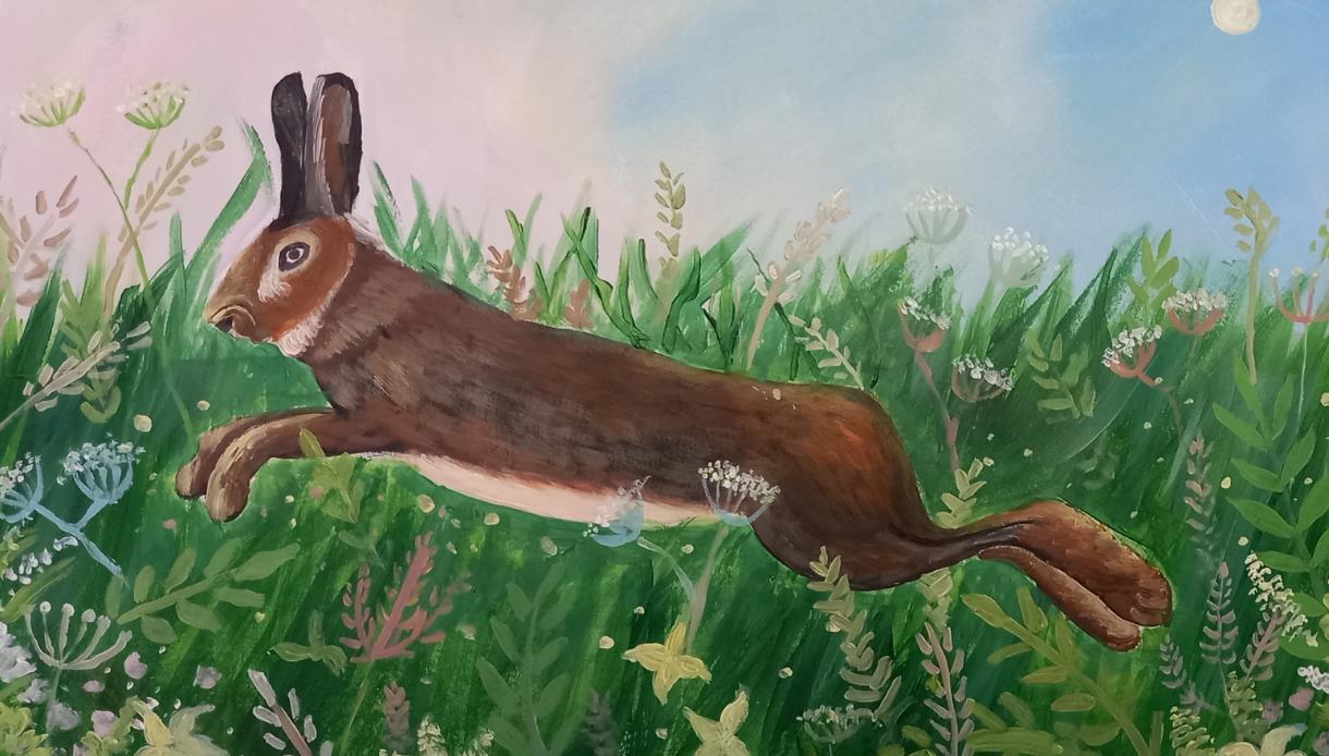 A painted spring scene featuring a brown hare leaping through tall green grass and wildflowers.