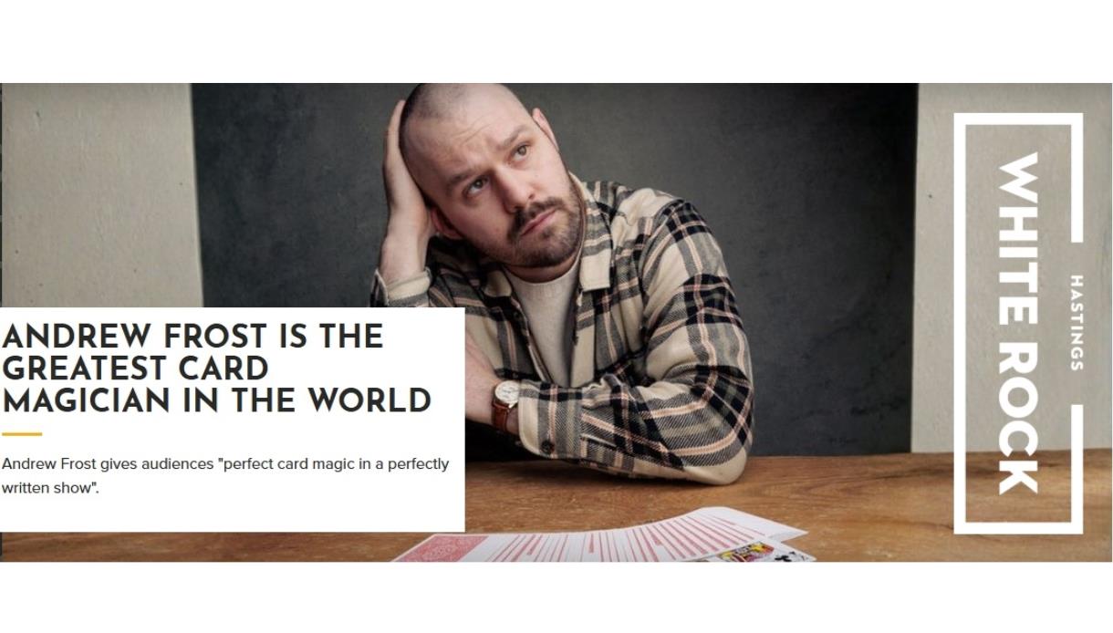 Promotional image for card magician Andrew Frost, showing a performer seated at a table with playing cards spread out.