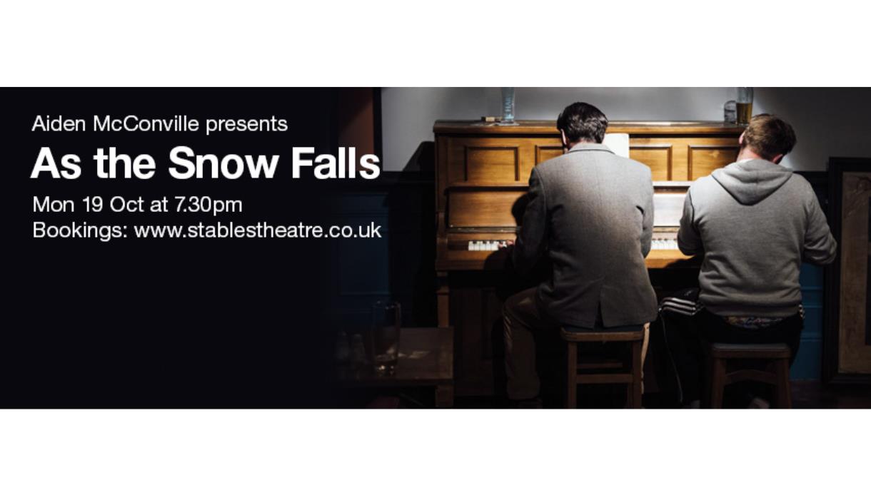 Poster for “As the Snow Falls” featuring two performers seated at a piano on stage at Stables Theatre.