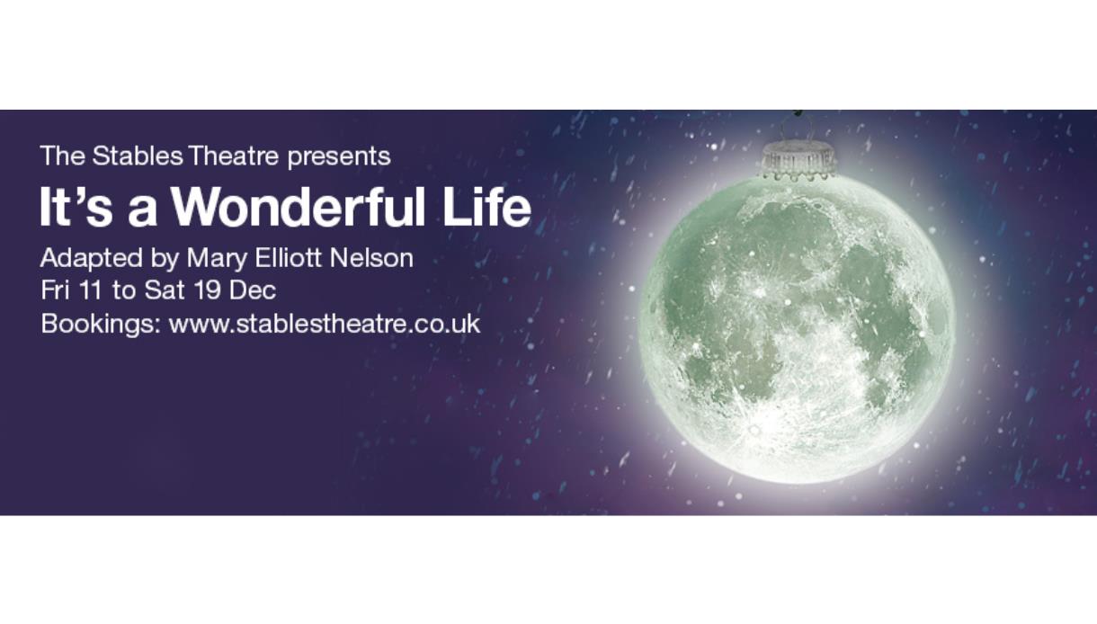 Poster for “It’s a Wonderful Life” featuring a moon-shaped Christmas bauble glowing against a snowy night sky.