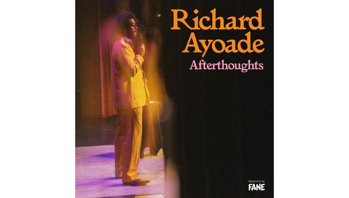 Promotional image for Richard Ayoade: Afterthoughts, showing a performer on stage under warm theatre lighting.